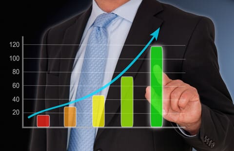 business man analyzing a growth chart