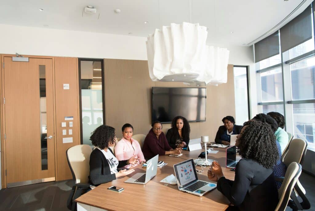 Business leaders collaborating around a conference table